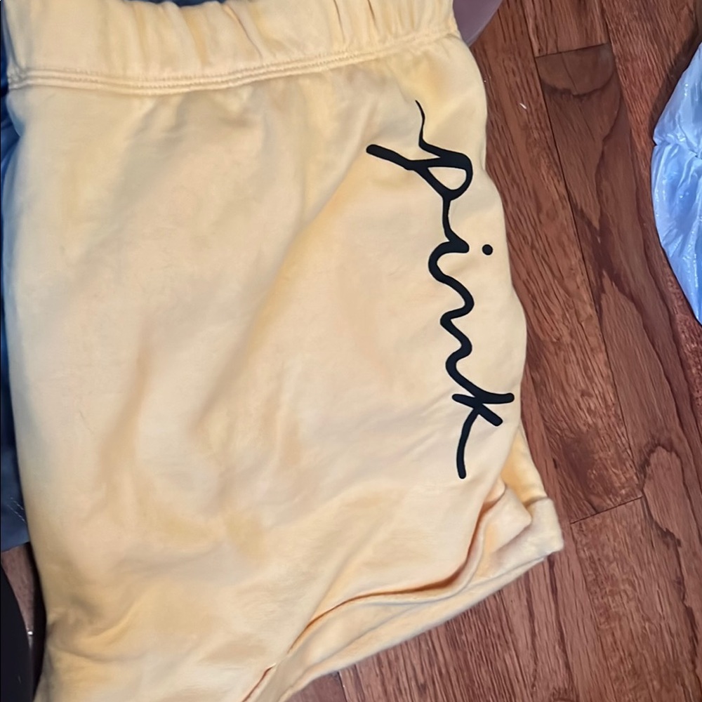 Yellow Shorts with Black Script